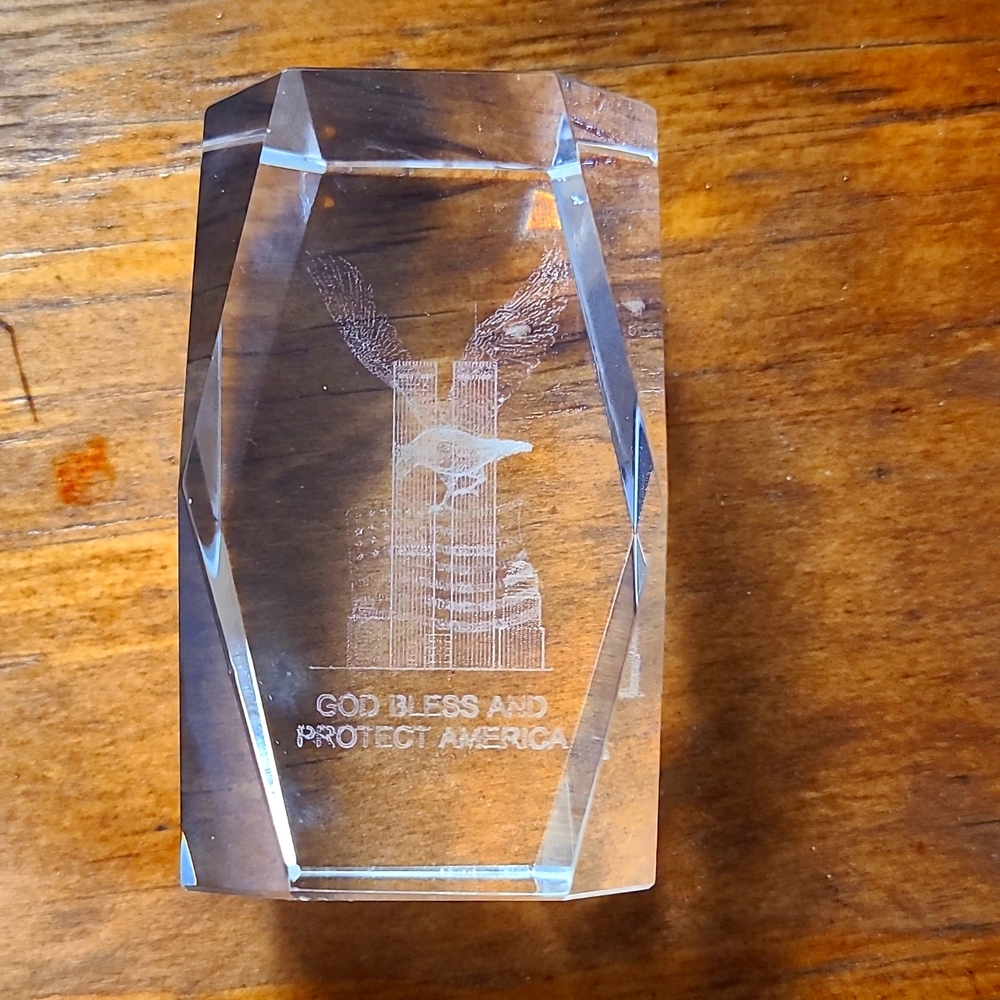 Decoration and glass paperweight with engraved holagram.